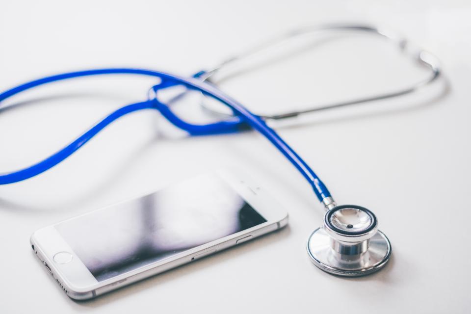 Stethoscope lying on a white table