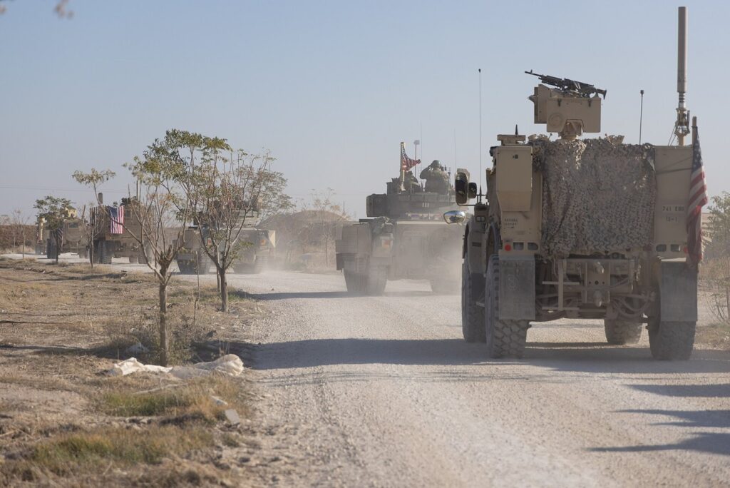 Military armored vehicles in a convoy